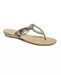 Dare to bare your summer toes with the Licks sandals by Marc Fisher. Bold metal hardware perfectly complements the racy finish of the straps. Dare to bare your summer toes with the Licks sandals by Marc Fisher. Bold metal hardware perfectly complements the racy finish of the straps.