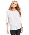 In a relaxed shape, this MICHAEL Michael Kors keyhole tunic is perfect for adding stylish ease to your spring wardrobe!