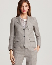 Perfect office sophistication in a MARC BY MARC JACOBS blazer--tailored to perfection with three-button cuffs and a double-button front closure. Paired with matching trousers the look is polished and complete. Perfect office sophistication in a MARC BY MARC JACOBS blazer--tailored to perfection with three-button cuffs and a double-button front closure. Paired with matching trousers the look is polished and complete.