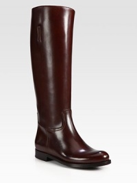 Classic style of fine leather with a stacked heel. Stacked heel, 1½ (40mm)Shaft, 15Leg circumference, 15Leather upperInterior pull-tabsLeather liningRubber and wooden solePadded insoleMade in Italy Classic style of fine leather with a stacked heel. Stacked heel, 1½ (40mm)Shaft, 15Leg circumference, 15Leather upperInterior pull-tabsLeather liningRubber and wooden solePadded insoleMade in Italy