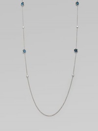 From the Silver Rain Lollipop Collection. This delicate, sterling silver link chain style features dazzling diamond and exquisite blue topaz stations. Blue topazDiamonds, .25 tcwSterling silverLength, about 36Lobster clasp closureImported From the Silver Rain Lollipop Collection. This delicate, sterling silver link chain style features dazzling diamond and exquisite blue topaz stations. Blue topazDiamonds, .25 tcwSterling silverLength, about 36Lobster clasp closureImported