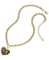 Be the predator, not the prey. GUESS's animal-inspired heart pendant features a fun, leopard print in black and brown epoxy and light Colorado topaz stones. Set in gold tone mixed metal. Approximate length: 16 inches + 2-inch extender. Approximate drop: 1 inch.