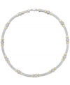 Try a trendy two-tone style. This intricate cable link necklace is crafted in 14k gold and sterling silver for a versatile touch, while sparkling diamond accents add shine. Approximate length: 16 inches.