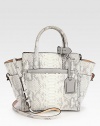 A sculptural design in ultra-luxurious python with leather accents. Double top handles, 4¼ dropDetachable adjustable shoulder strap, 21-22¼ dropTop zip closureFour outside open pocketsOne detachable zip pouchOne inside zip pocketTwo inside open pocketsCotton lining9¾W X 9½H X 4¾DImported