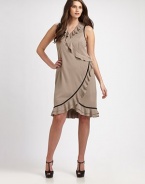 Flattering asymmetrical ruffles and Princess seams come together for a feminine design with an unbeatable silhouette. Asymmetrical ruffle detailsSleevelessPrincess seamsAsymmetrical sequin detailBraided trimSide zipperFully linedAbout 24 from natural waist65% rayon/30% nylon/5% spandexDry cleanMade in Italy