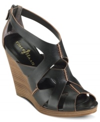 High style, supreme comfort. Cole Haan's Air Kimrey platform wedges are fully leather-lined with concealed Nike AIR technology in the outsole. High style, supreme comfort. Cole Haan's Air Kimrey platform wedges are fully leather-lined with concealed Nike AIR technology in the outsole.
