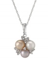 A gorgeous grouping. This sterling silver necklace dazzles with a pendant that brings together multicolored freshwater pearls (7-7-1/2 mm) and white topaz (1/6 ct. t.w.) for a stunning effect. Approximate length: 18 inches. Approximate drop: 7/8 inch.