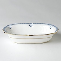 Though Grenville's geometric shapes and studs, set in a narrow border, lend the pattern a modern feel, the stylish leaf and flower elements closely follow classic Derby tradition. Though Grenville's geometric shapes and studs, set in a narrow border, lend the pattern a modern feel, the stylish leaf and flower elements closely follow classic Derby tradition.