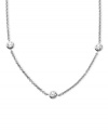 Delicate design with a touch of sparkle. Arabella's pretty necklace is set in sterling silver with seven round-cut Swarovski zirconia stations (3-1/6 ct. t.w.). Approximate length: 18 inches.