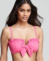 In a girlish silhouette, this Betsey Johnson bikini top reaches perfection when paired with the season's cat eye shades. A subtle tonal texture sets the Cake Pop top apart from same-old swimwear.