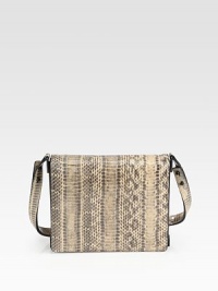 A classic shoulder style in luxurious snakeskin with leather accents.Adjustable shoulder strap, 12-23½ dropMagnetic flap closureThree inner compartmentsTwo inside open pocketsFour credit card slotsCotton lining8½W X 7H X 2¼DImported A classic shoulder style in luxurious snakeskin with leather accents.Adjustable shoulder strap, 12-23½ dropMagnetic flap closureThree inner compartmentsTwo inside open pocketsFour credit card slotsCotton lining8½W X 7H X 2¼DImported