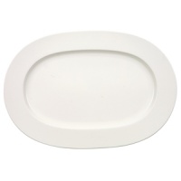 Anmut will be the choice for purists; it is an undecorated white that beautifully shows off the glamorous forms and quality bone china. Dishwasher and microwave safe. Accessories shown: oval platter, round vegetable bowl, creamer, sugar bowl. Anmut will be the choice for purists; it is an undecorated white that beautifully shows off the glamorous forms and quality bone china. Dishwasher and microwave safe. Accessories shown: oval platter, round vegetable bowl, creamer, sugar bowl.