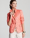 Add a shot of sunshine to your winter repertoire with this BASLER quilted jacket. The chic Mandarin cut comes covered in a cheery citrus hue and lined with tropical visions.
