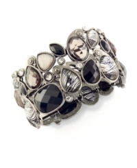 Mix and match your favorite accessories and ensembles with this wild style. Style&co. bracelet features plastic and glass beads in sparkling neutral tones and fierce animal prints. Setting crafted in mixed metal. Bracelet stretches to fit wrist. Approximate diameter: 2 inches.