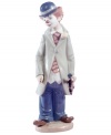 No joke. This Circus Sam figurine is handcrafted in Lladro porcelain, wearing a classic red clown nose and oversized clothes.
