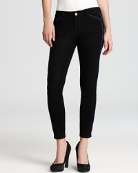 Black washed Paige Denim jeans in the sought-after ultra-skinny silhouette, enriched with contrast piping details for added flourish. Black washed Paige Denim jeans in the sought-after ultra-skinny silhouette, enriched with contrast piping details for added flourish.