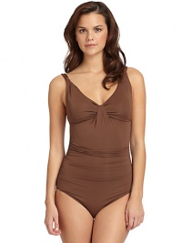 THE LOOKBraided details on shoulder straps Padded cups with center pleatEmpire waistShirred sidesSquare backTHE MATERIAL87% nylon/13% spandexPolyurethane cupsFully linedCARE & ORIGINHand washImportedPlease note: Bikini bottom sold separately. THE LOOKBraided details on shoulder straps Padded cups with center pleatEmpire waistShirred sidesSquare backTHE MATERIAL87% nylon/13% spandexPolyurethane cupsFully linedCARE & ORIGINHand washImportedPlease note: Bikini bottom sold separately.