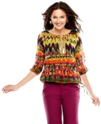 Sequined & beaded details add high-shine to this boldy printed Calvin Klein top -- perfect for adding a punch of color to your wardrobe! Sequined & beaded details add high-shine to this boldy printed Calvin Klein top -- perfect for adding a punch of color to your wardrobe!
