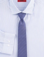 Subtle stripes define this modern, tailored dress shirt.ButtonfrontSpread collarCottonDry cleanImported