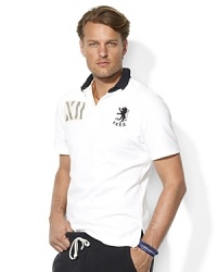 Imbued with vintage-inspired style, a trim-fitting short-sleeved rugby shirt is crafted from soft utility jersey with bold heritage embroidery. Imbued with vintage-inspired style, a trim-fitting short-sleeved rugby shirt is crafted from soft utility jersey with bold heritage embroidery.