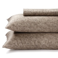 This luxurious combed cotton Calvin Klein sheet set boasts a rubbed textural print in cream, sepia and pebble grey for an infusion of easy, weathered elegance to your decor. This luxurious combed cotton Calvin Klein sheet set boasts a rubbed textural print in cream, sepia and pebble grey for an infusion of easy, weathered elegance to your decor.
