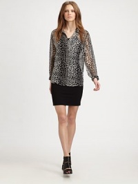 Semi-sheer silk top in a lavish leopard print with a single front patch pocket and length that hits below the hips. Point collarButton frontSingle front patch pocketLong sleevesButtoned cuffsLonger length hits below the hipsSilkDry cleanImportedModel shown is 5'10 (177cm) wearing US size Small.