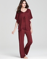 A slouchy caftan top creates an unexpected silhouette for Midnight by Carole Hochman's lace-trimmed sleep set. A slouchy caftan top creates an unexpected silhouette for Midnight by Carole Hochman's lace-trimmed sleep set.