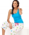 Bright with a colorful print. Jenni's blue tank and printed pajama pants are perfect for comfortable lounging.
