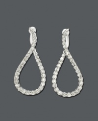 Let looping diamonds illuminate your lobes. Earrings are fashioned in a twist hoop design and feature round-cut diamond (1 ct. t.w.) in a 14k white gold setting. Approximate diameter: 1-1/10 inches. Let looping diamonds illuminate your lobes. Earrings are fashioned in a twist hoop design and feature round-cut diamond (1 ct. t.w.) in a 14k white gold setting. Approximate diameter: 1-1/10 inches.