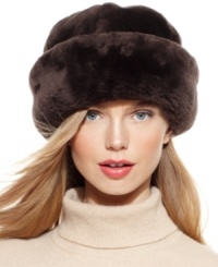 Let it snow; you'll be warm and cozy with this chic shearling hat from Surell that makes a cold winter wind seem like a summer breeze. Let it snow; you'll be warm and cozy with this chic shearling hat from Surell that makes a cold winter wind seem like a summer breeze.