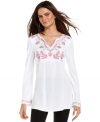 Whether you're wearing it as a coverup at the beach or atop a flirty skirt, INC's embroidered tunic adds exotic appeal!