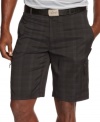 Extend your solid style from the green to your gear with these plaid shorts from Greg Norman for Tasso Elba.