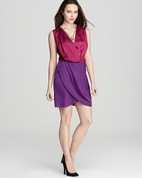 Captivating color blocking defines this stunning VINCE CAMUTO stretch satin dress. Thoughtfully designed with an interior snap at the deep v neckline to ensure full coverage.