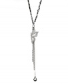 Get breezy, California style in GUESS's chic butterfly pendant. Y-shaped necklace features a glittering butterfly with Mother of Pearl and crystal-accented wings. Setting and chain drop crafted in silver tone mixed metal with sparkling crystal accents and black woven ribbon. Approximate length: 16 inches + 2-inch extender. Approximate drop: 3 inches.