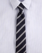 Trim stripes, pared in width to balance the cut of modern suits and jackets.Silk/cotton Dry clean Made in USA