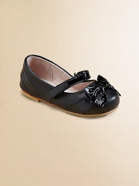 Charming Mary Janes of rich sheepskin leather with accents and a pretty bow of shiny patent leather.Adjustable grip-tape close strapLeather upperLeather footbed and liningPadded insoleLeather and rubber soleImported Charming Mary Janes of rich sheepskin leather with accents and a pretty bow of shiny patent leather.Adjustable grip-tape close strapLeather upperLeather footbed and liningPadded insoleLeather and rubber soleImported