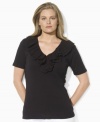 Lauren by Ralph Lauren's classic short-sleeved plus size knit top is updated with feminine panache, featuring a ruffled eyelet neckline.