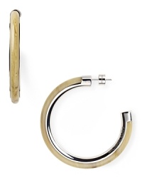 Add exotic edge to your accessory collection with MICHAEL Michael Kors' horn earrings. Whether you're downtown or on safari, these haute hoops love bright separates and a wild itinerary.