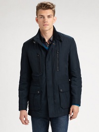 Fit and functionality are key elements of this well-crafted field jacket, inspired by traditional outerwear pieces. Elbow patches, a stand collar with buckle detail and an array of pockets combines endless comfort and versatility with a signature finish.Zip-frontSnap-button placketStand collarZippered chest, waist flap pocketsSide ventsAbout 29 from shoulder to hemPolyesterMachine washImported