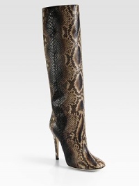 Cowboy grit meets cocktail glitz in this ultra-luxe python boot. Self-covered heel, 4¾ (120mm)Shaft, 15Leg circumference, 13¼Python upperPull-on styleLeather lining and solePadded insoleMade in Italy