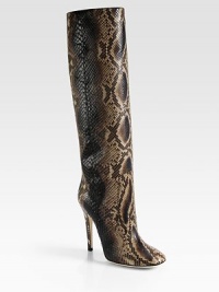 Cowboy grit meets cocktail glitz in this ultra-luxe python boot. Self-covered heel, 4¾ (120mm)Shaft, 15Leg circumference, 13¼Python upperPull-on styleLeather lining and solePadded insoleMade in Italy Cowboy grit meets cocktail glitz in this ultra-luxe python boot. Self-covered heel, 4¾ (120mm)Shaft, 15Leg circumference, 13¼Python upperPull-on styleLeather lining and solePadded insoleMade in Italy