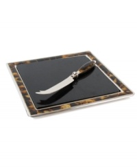 The alluring beauty of a multifaceted tortoiseshell finish presents a warm accent to clean stainless steel in this refined serveware from Lauren by Ralph Lauren. The alluring beauty of a multifaceted tortoiseshell finish presents a warm accent to clean stainless steel in this refined serveware from Lauren by Ralph Lauren.