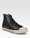 A classic Converse look in smooth leather with nailhead stud detail. Rubber toe cap Padded insole Rubber sole Imported 