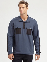 Fleece pullover with modern inspirations, accented with nylon contrasting trim and double-chest pockets for a handsome finish.Button-front95% cotton/5% lycraMachine washImported Fleece pullover with modern inspirations, accented with nylon contrasting trim and double-chest pockets for a handsome finish.Button-front95% cotton/5% lycraMachine washImported