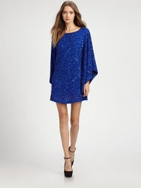 Dramatic bell sleeves define the shape of this glittering sequined silk shift.BoatneckDropped shouldersBell sleevesCenter back zipperAbout 19 from natural waistSilkDry cleanImportedModel shown is 5'10 (177cm) wearing US size 4. Dramatic bell sleeves define the shape of this glittering sequined silk shift.BoatneckDropped shouldersBell sleevesCenter back zipperAbout 19 from natural waistSilkDry cleanImportedModel shown is 5'10 (177cm) wearing US size 4.
