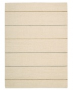 Subtle striping gives way to understated sophistication in the Horizon area rug from Calvin Klein. Generously thick wool fibers are hand tufted in India for remarkable strength and detailed design. Perfect for mixing with any style decor. (Clearance)
