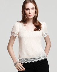 Fresh and feminine, this Madison Marcus blouse is the ladylike wardrobe update you've been waiting for. Sweet scallop trim is delightful on the hem and short sleeves, perfect for the trans-seasonal weather. Fresh and feminine, this Madison Marcus blouse is the ladylike wardrobe update you've been waiting for. Sweet scallop trim is delightful on the hem and short sleeves, perfect for the trans-seasonal weather.