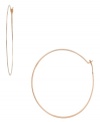 Accessorize with attitude! Michael Kors large hoop earrings make a statement in trendy rose gold tone mixed metal. Approximate diameter: 2-1/4 inches.