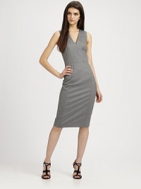 Luxurious Italian wool is crafted with impeccable tailoring for a sleek, structured dress. V neckWide shoulder strapsSleevelessPaneled structureBack zip closurePartially linedAbout 27 from natural waist96% wool/4% lycraDry cleanMade in USAModel shown is 5'10 (177cm) wearing US size 4. Luxurious Italian wool is crafted with impeccable tailoring for a sleek, structured dress. V neckWide shoulder strapsSleevelessPaneled structureBack zip closurePartially linedAbout 27 from natural waist96% wool/4% lycraDry cleanMade in USAModel shown is 5'10 (177cm) wearing US size 4.