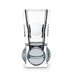 Industrial and geometric shapes inspire the new Geode collection. Clear, full-lead crystal cube with magnifying lenses on lower sides and two round cuts on upper sides. Generous, stable shape. Designed by Thomas Bastide.